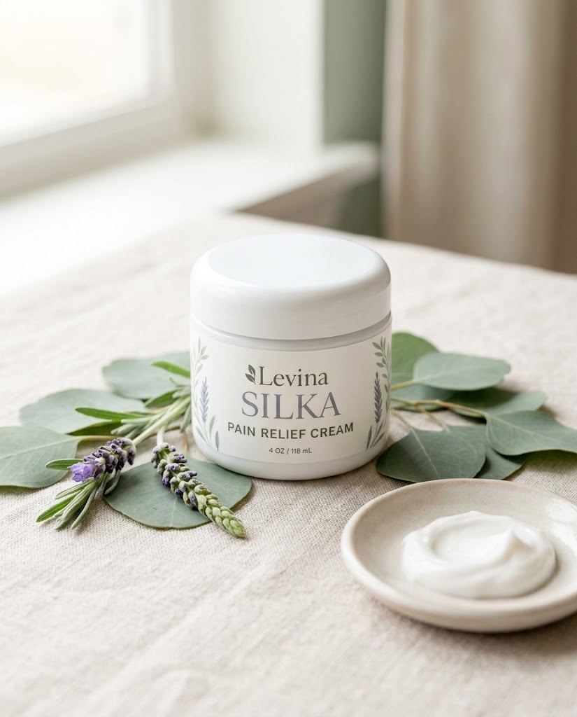 Levina Silka jar on linen with lavender, eucalyptus and a dish of cream