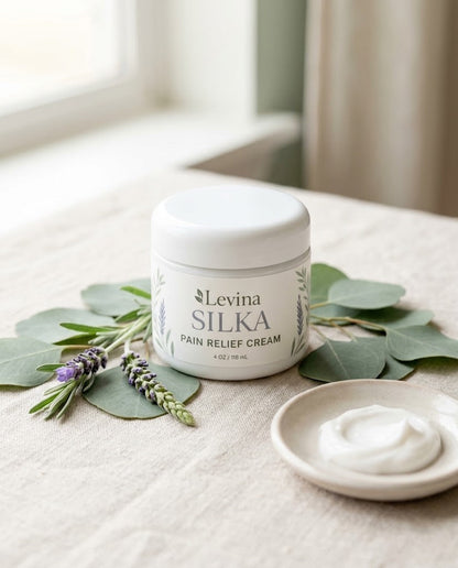 Levina Silka jar on linen with lavender, eucalyptus and a dish of cream